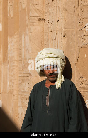 Egyptian keeper in the Temple of Edfu, dedicated to the falcon god Horus, Egypt Stock Photo
