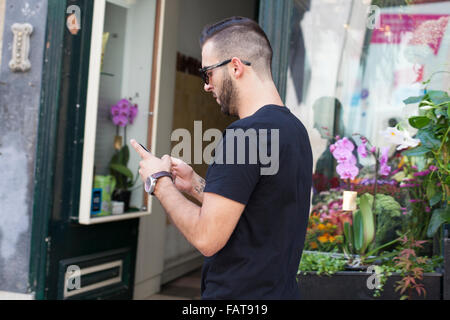 Man looking at cell phone. Stock Photo