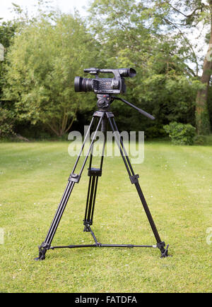 professional HD camcorder on tripod Stock Photo