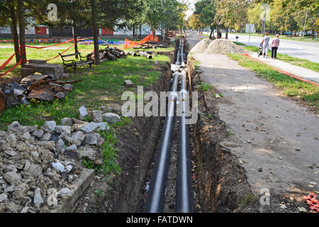 Work on installing the street which is used for domestic heating. Stock Photo