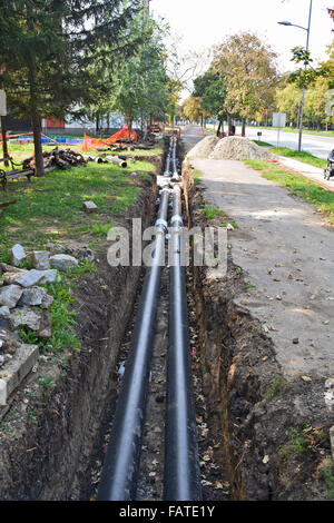 Work on installing the street which is used for domestic heating. Stock Photo