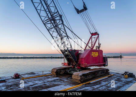 Fraser River Pile and Dredge, pile driving crane on barge, Steveston, Richmond, British Columbia, Canada, Stock Photo