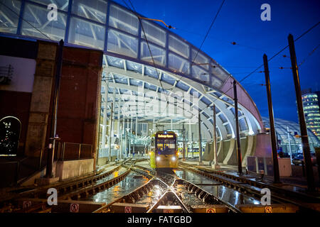 Manchester Metrolink tram along second crossing at Victoria Station   Tram metrolink light rail rapid commuters transportation Stock Photo