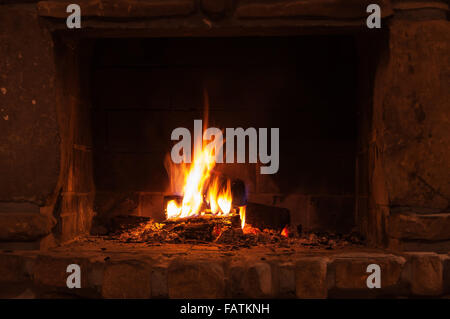 Burning and glowing pieces of wood in Fireplace Stock Photo - Alamy