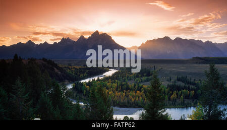 Panoramic view of Oxbow bend on Snake River with Grand Tetons at sunrise near Jackson Hole, Wyoming Stock Photo