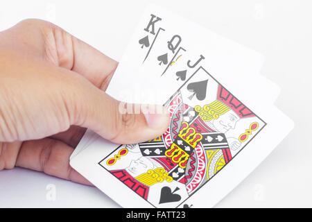 Playing cards in hand isolated on white background, stock photo Stock Photo