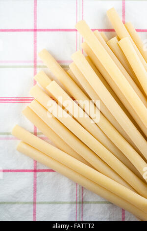 Candele pasta on table cloth Stock Photo