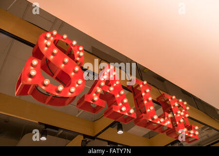 Vintage sale sign with light bulbs hanging on the roof Stock Photo