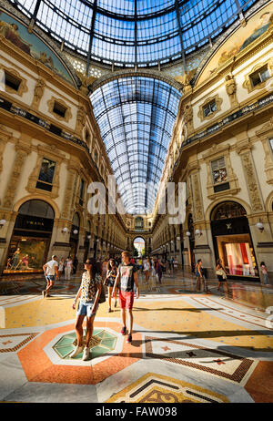 MILAN, ITALY - AUGUST 29, 2015: Luxury Store in Galleria Vittorio Emanuele II shopping mall in Milan, with tasted Italian restau Stock Photo