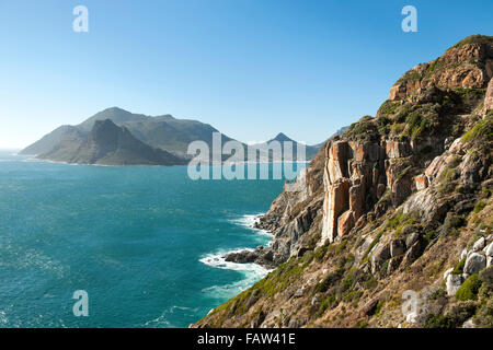 The Sentinel mountain and part of Hout Bay seen from Chapman's Peak Drive on the Atlantic coastline in Cape Town, South Africa. Stock Photo