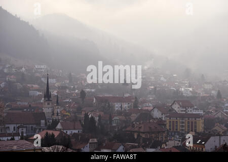 Winter scene at dawn with Schei district, the old town of Brasov city in Romania Stock Photo