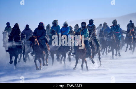 West Ujimqin Banner, China's Inner Mongolia Autonomous Region. 5th Jan, 2016. Herdsmen race horses in West Ujimqin Banner, north China's Inner Mongolia Autonomous Region, Jan. 5, 2016. Credit:  Ren Junchuan/Xinhua/Alamy Live News Stock Photo