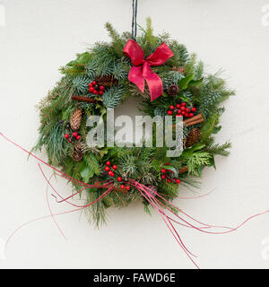 A Christmas Wreath hanging on a wall
