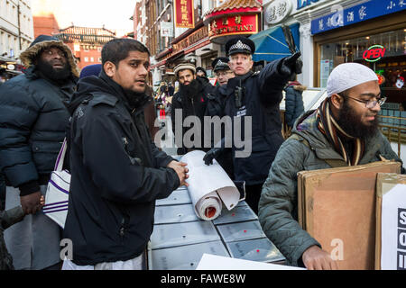 FILE IMAGES: London, UK. 22nd Nov, 2013.  File Images: Islamist Siddhartha Dhar (also known as Abu Rumaysah) seen here 2nd left during a protest in 2013 Credit:  Guy Corbishley/Alamy Live News Stock Photo