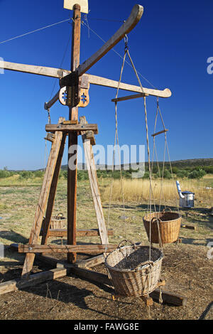 Medieval childrens carousel model on a fairground of a renaissance festival. Stock Photo