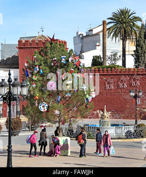 Moorish red castle walls in Plaza de la Constitucion Alhama de Granada ( 1482 the fortress town was taken from the Moorish Sultanate ) Spanish Spain Andalusia Stock Photo