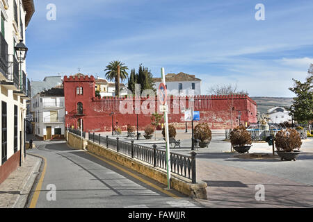 Moorish red castle walls in Plaza de la Constitucion Alhama de Granada ( 1482 the fortress town was taken from the Moorish Sultanate ) Spanish Spain Andalusia Stock Photo