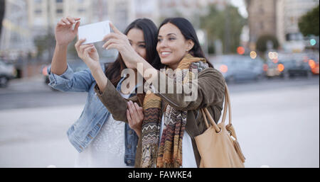 Two gorgeous women posing for a selfie Stock Photo