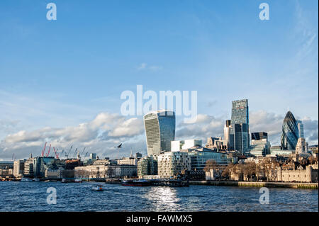 View from the Tower Bridge on the river thames, with London Tower and skyscrapers in the financial district, London. Stock Photo