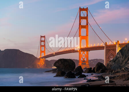 Golden Gate Bridge, Marshall's beach, night, rocky coast, San Francisco, USA Stock Photo
