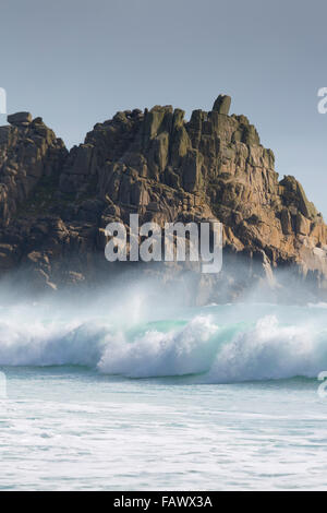 Porthcurno; Waves on Rock; Cornwall; UK Stock Photo