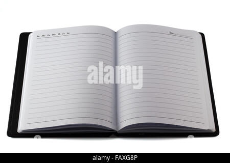 The black leather moleskin notebook on white. Stock Photo