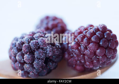 Close-up on a group of blackberries in a spoon on a table Stock Photo
