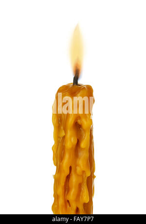 Old vintage church burned candle wax close-up isolated on a white background. Stock Photo