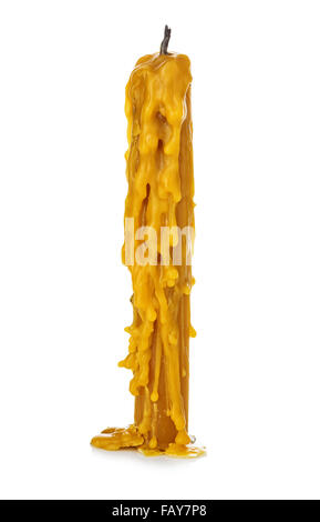 Old vintage church burned candle wax close-up isolated on a white background. Stock Photo