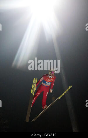 Bischofshofen, Austria. 05th Jan, 2016. Noriaki Kasai of Japan soars through the air during the qualification of the fourth stage of the Four Hills ski jumping tournament in Bischofshofen, Austria, 05 January 2016. Photo: Daniel Karmann/dpa/Alamy Live News Stock Photo