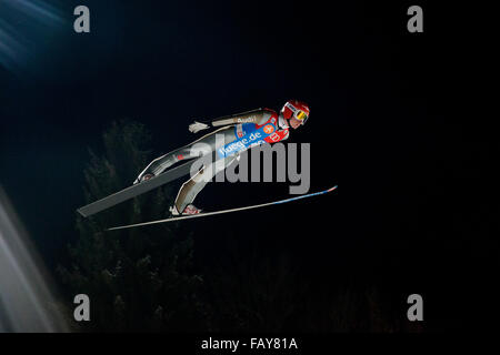 Bischofshofen, Austria. 05th Jan, 2016. Richard Freitag of Germany soars through the air during the qualification of the fourth stage of the Four Hills ski jumping tournament in Bischofshofen, Austria, 05 January 2016. Photo: Daniel Karmann/dpa/Alamy Live News Stock Photo