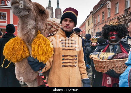 Camel carrying gifts for Jesus and one of Three Wise Men at Epiphany (Three Kings) Holiday procession in Wroclaw, Poland Stock Photo