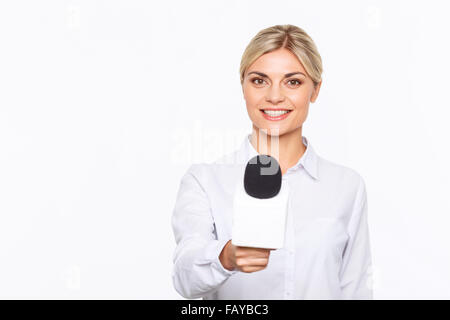 Agreeable TV announcer being involved in work Stock Photo