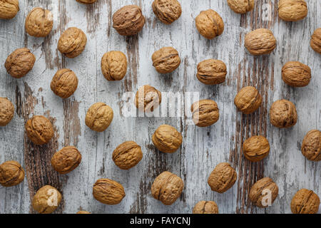 Walnuts in a wood background Stock Photo