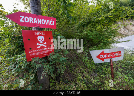 minefield next to road near Sarajevo city, capital of Bosnia and Herzegovina Stock Photo