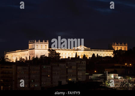 The Palace of Ajuda in Lisbon, Portugal. The royal palace is illuminated at night. Stock Photo