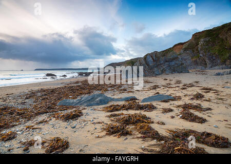 Moody skies over Hemmick Beach on the south coast of Cornwall Stock Photo