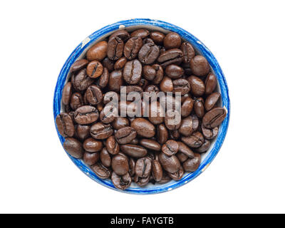 many whole roasted coffee beans in round blue cup isolated on white Stock Photo