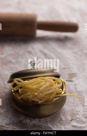 Pasta all'uovo and rolling pin Stock Photo