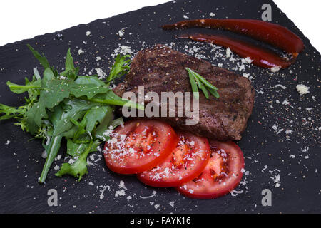 Grilled veal steak with vegetables Stock Photo