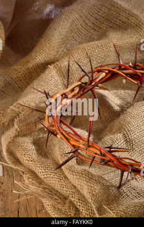 crown made of thorns isolated on sack textile Stock Photo