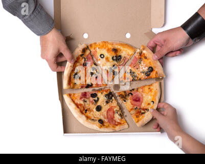 Group of young friends taking pizza slices, top view isolated on white background Stock Photo