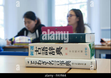 Japanese text books and students in school language class Stock Photo