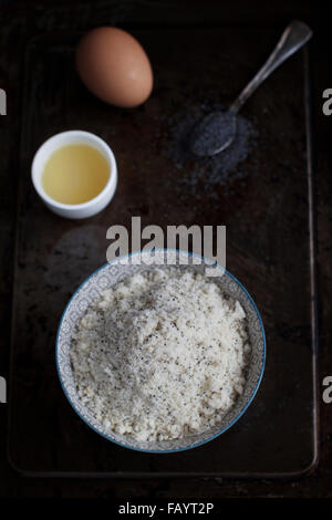 Work in progress for lime poppy seed cake: preparing the batter Stock Photo