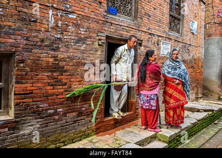 Group of people discuss in the street of Kathmandu Stock Photo
