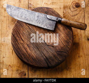 Chopping board block and Meat cleaver large chef's knife on wooden background Stock Photo