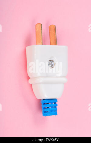 American Outlet Plug on pink background Stock Photo - Alamy