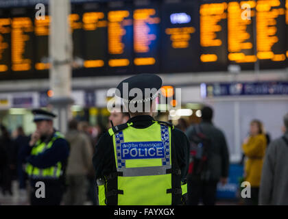 The Metropolitan Police are posting more officers in Underground Stations following the suspected terrorist attack at Leytonstone Underground Station.  Featuring: British Transport Police Officer Where: London, United Kingdom When: 06 Dec 2015 Stock Photo