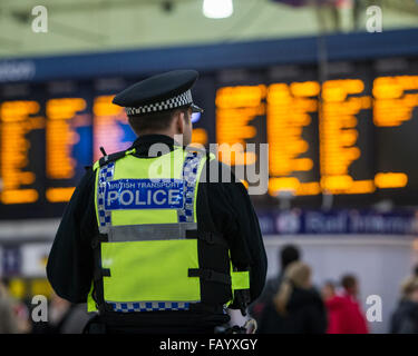 The Metropolitan Police are posting more officers in Underground Stations following the suspected terrorist attack at Leytonstone Underground Station.  Featuring: British Transport Police Officer Where: London, United Kingdom When: 06 Dec 2015 Stock Photo