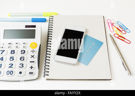 Smart phone and credit card with calculator for online banking and payment concept Stock Photo
